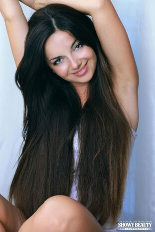 Awesome dark-haired young lady in a amazing image