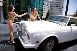 2   August Ames and Darcie Dolce wash senior car
