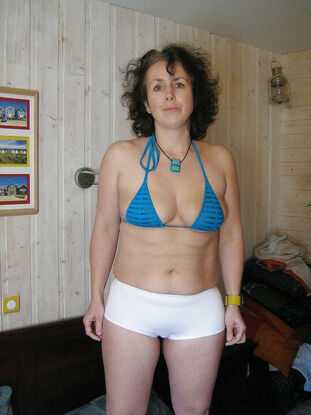 Wife nudist disrobes her clothes