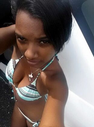 Beddable and youngster ebony sweethearts in teeny bikinis in