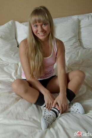 Hardly Legal blonde wears socks a sneakers while having