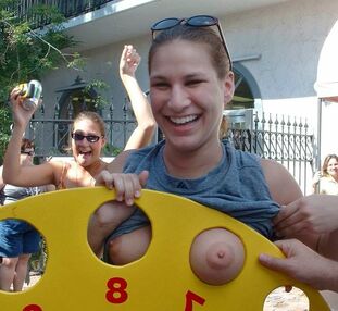 Nude ladies having fun on erotic festival, handmade photos