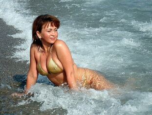 Ultra-cute  mature ex-wife with rock-hard bosoms sunbathing