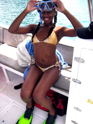 Secret, candid images of nubile dark-hued dame on vacation