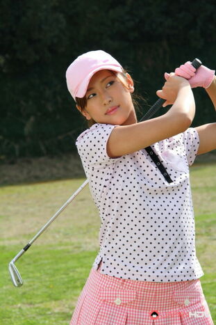Young woman Asian golfer Nao Yuzumiya shows a no g-string up
