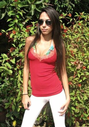 Brazilian youngster women posing, taut stretch trousers and