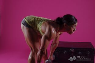 Magnificent bodybuilder Karen Garrett flaunts her muscles..