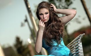 Pretty long hair woman sitting at tabouret 640x1136 iPhone