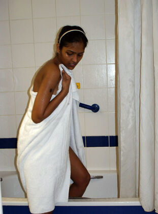 Cool ebony student bare in the bathroom and her big-titted