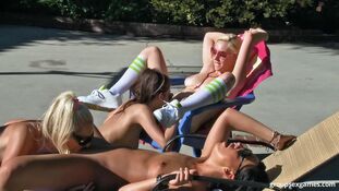Sunbathing dolls on lounge tabourets spontaneously determine