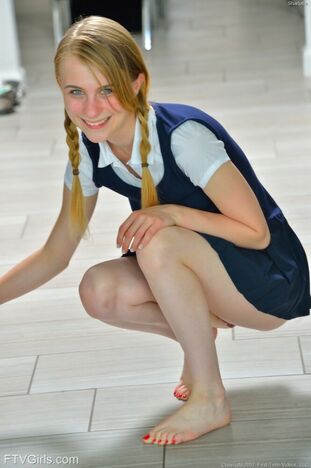 Small college girl Sharlotte in uniform arches over for a..